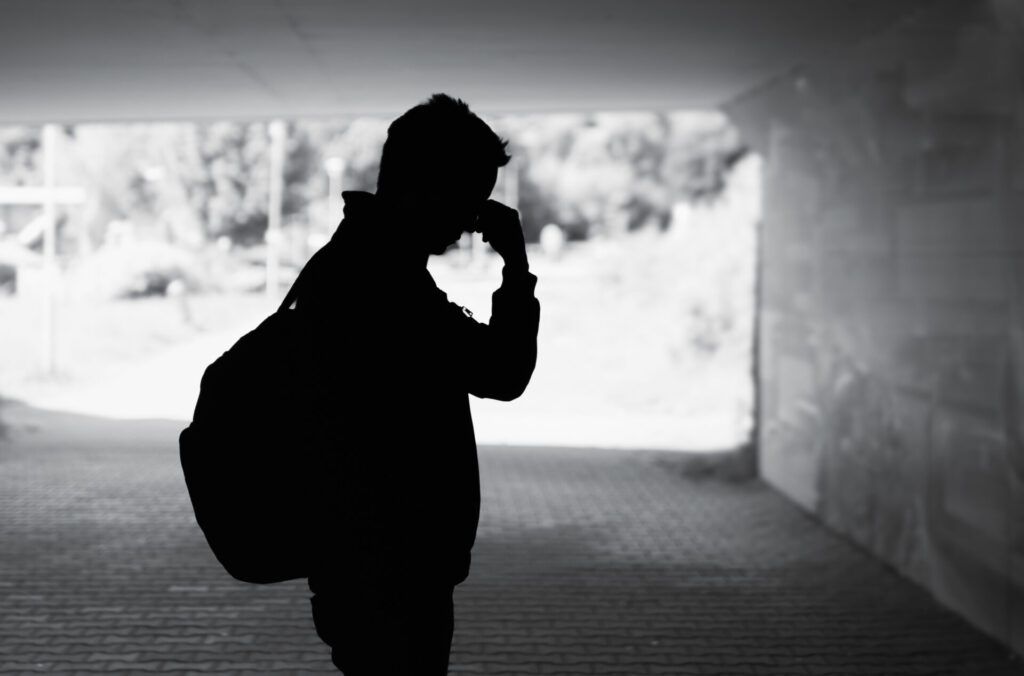 silhouette of person man feeling sad tired and depressed photo of therapy for grief and loss client in reno, nv