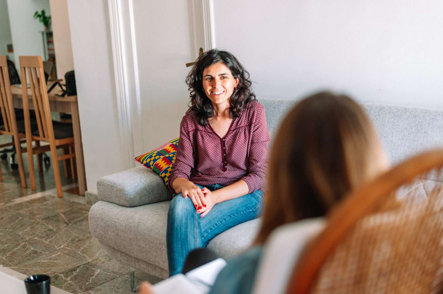 psychology and mental therapy concept - spanish woman patient and psychologist at psychotherapy session individual therapy in Reno client with Individual & Relationship Counseling Associates therapist