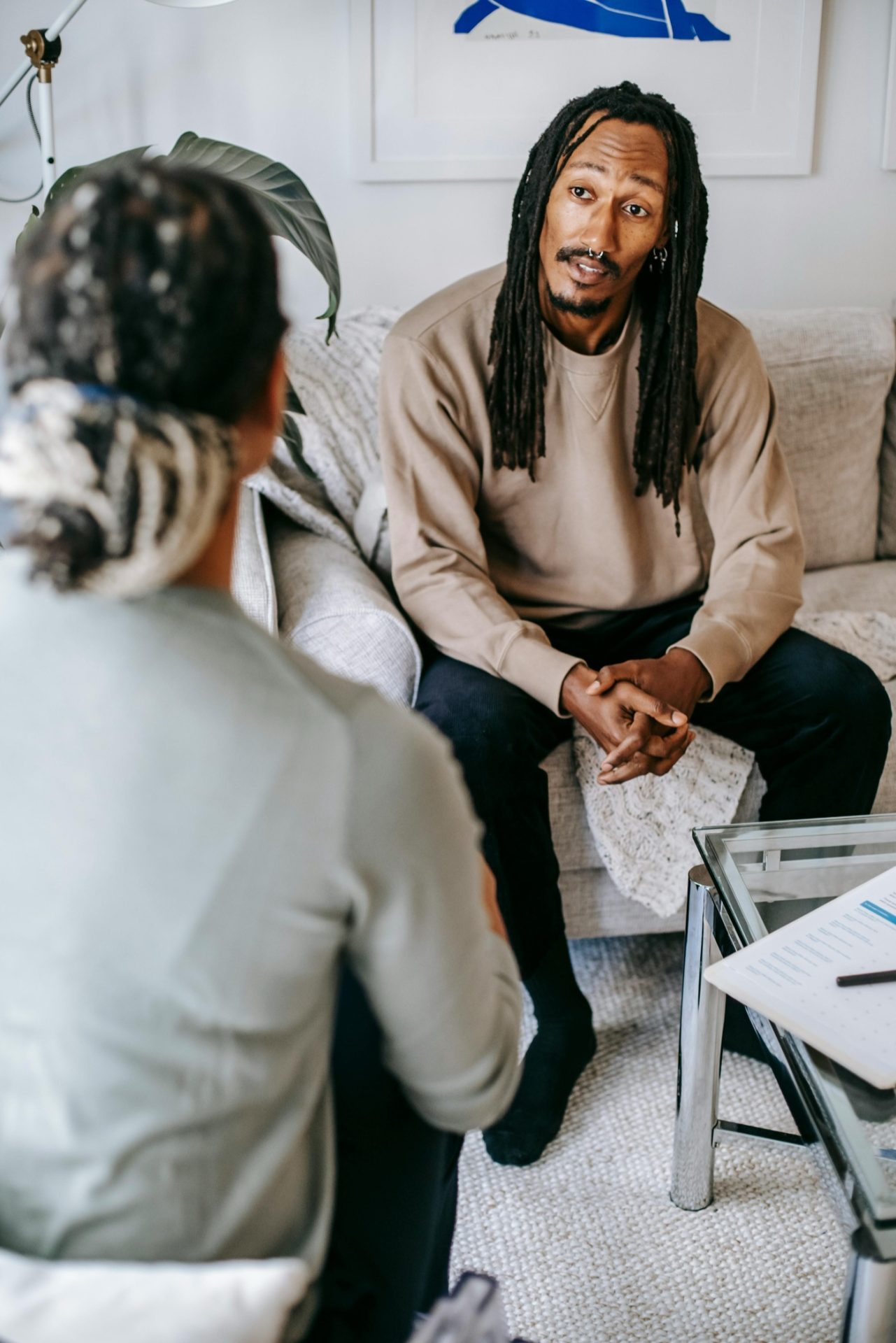 A therapist listening to a client during an individual therapy session